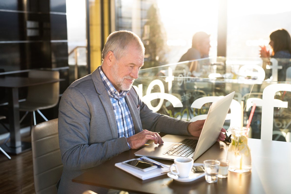 Businessman used public WiFi to work at a cafe