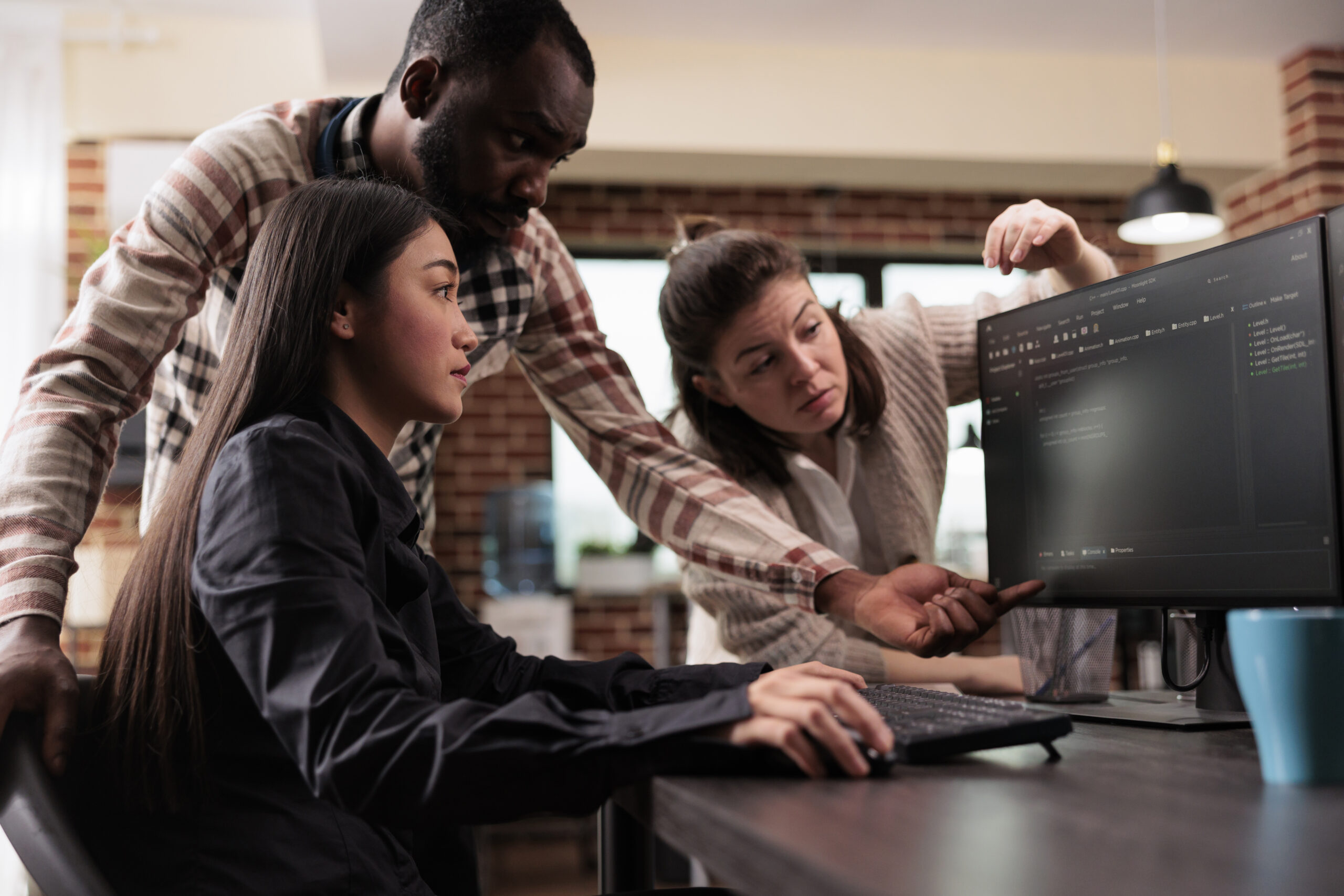 Cybersecurity team training employees during Cybersecurity Awareness Month